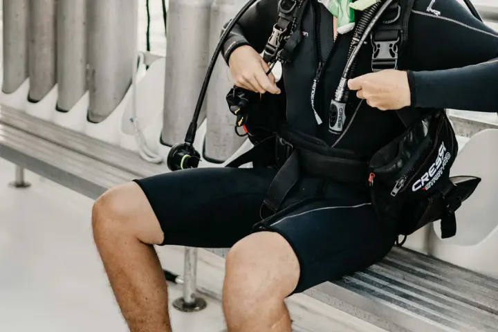 a man and a woman sitting on a bench