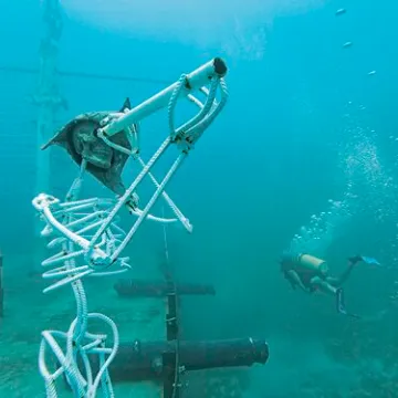 a group of people on a boat in the water
