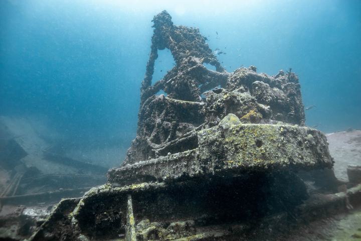 a man flying through the air on top of a mountain